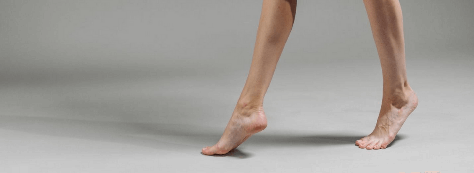 woman feet on tip toes