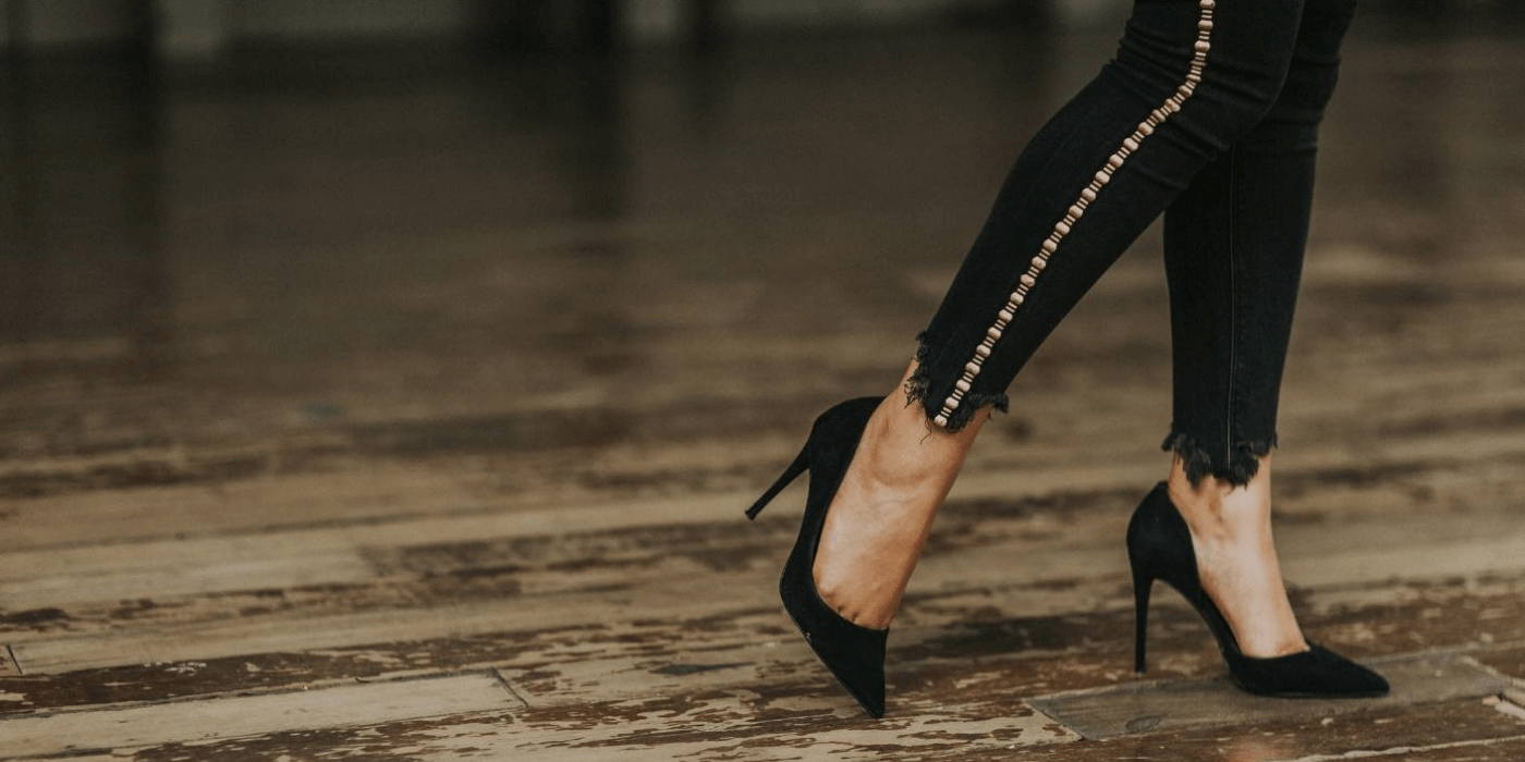 woman wearing black high heels fashion